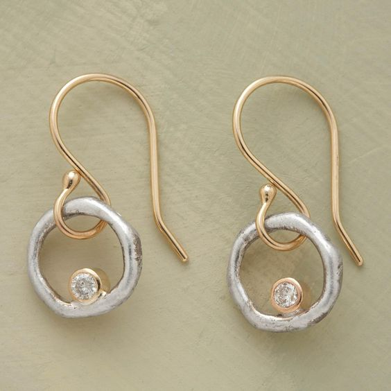 Vintage örhängen i guld och silver med zirkonia